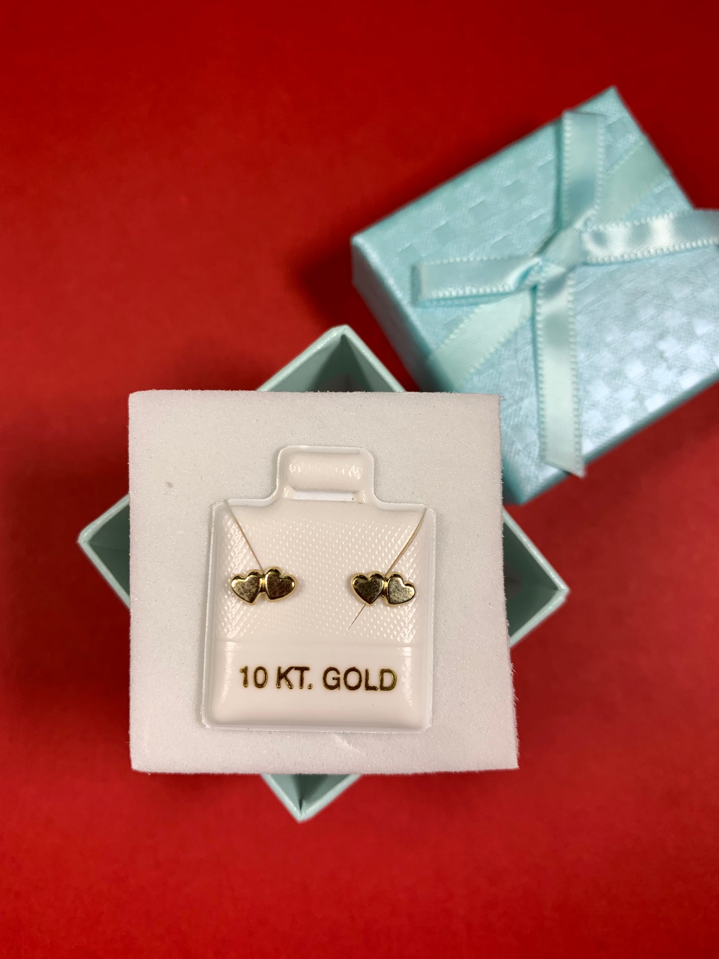 Arito de oro de 10KT en forma de corazones