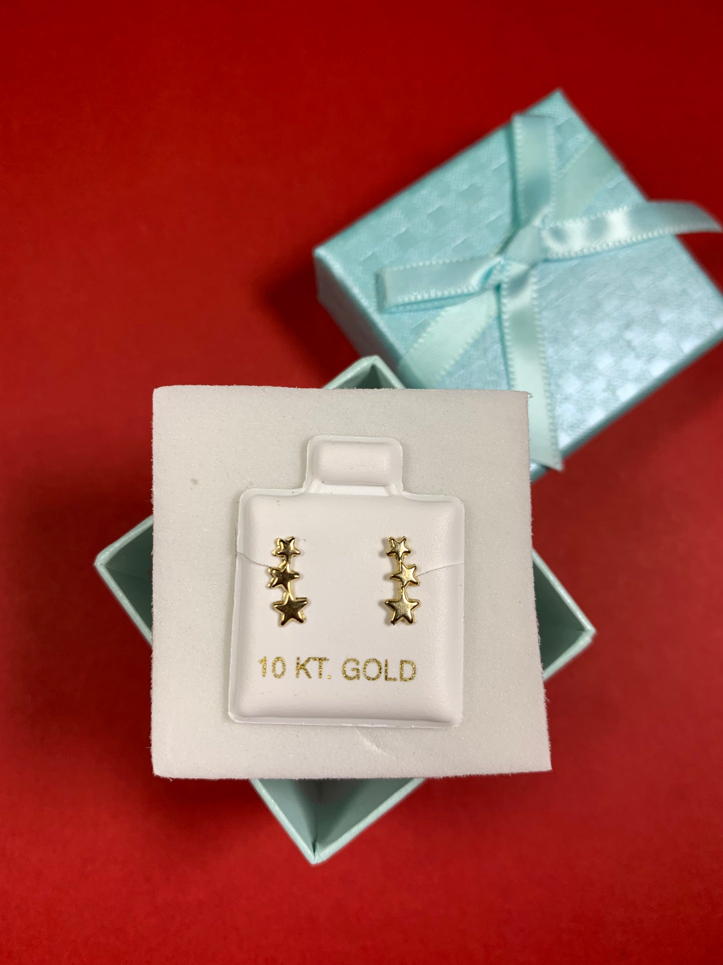 Arito de oro de 10KT en forma de estrellas